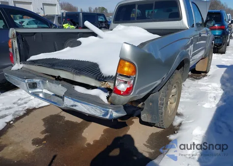 2001 Toyota Tacoma из США, поврежденный, VIN 5TEWM72N91Z785426